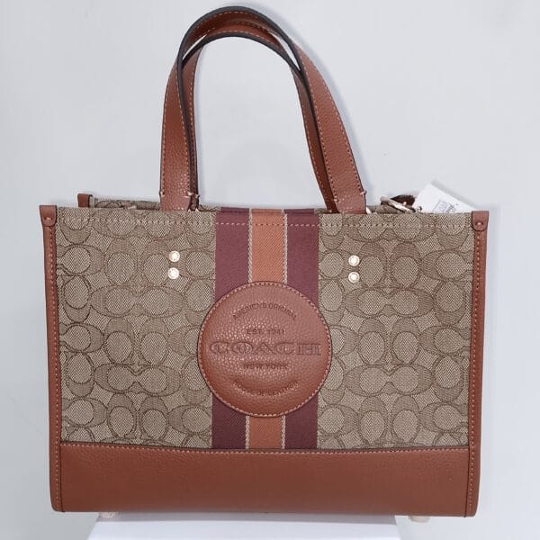 PETITSAC A MAIN COACH American's original house of leather